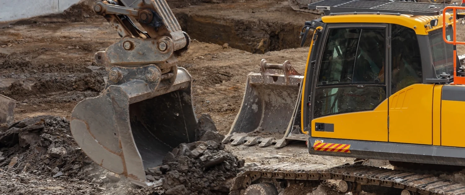 Excavator working on a commercial construction site